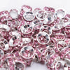 top view of a pile of 10mm Pink Large Hole Rondelle Spacer Beads - Set of 20