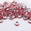 front view of a pile of 10mm Red Large Hole Rondelle Spacer Beads - Set of 20