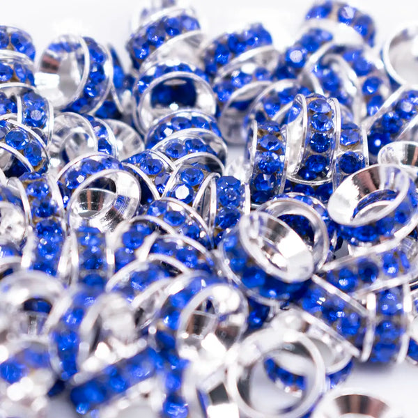 top view of a pile of 10mm Royal Blue Large Hole Rondelle Spacer Beads - Set of 20