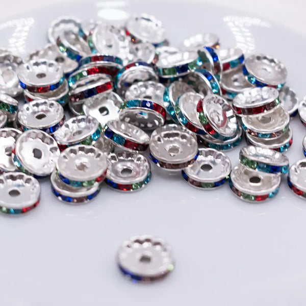 front view of a pile of Rainbow Rhinestone Rondelle Spacer Beads