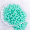 top view of a pile of 12mm Aqua Blue Neon Rhinestone Bubblegum Beads