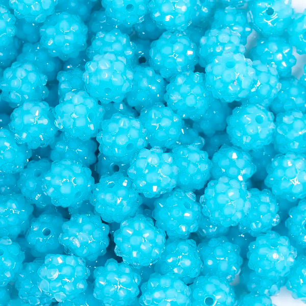 close up view of a pile of 12mm Blue Neon Rhinestone Bubblegum Beads