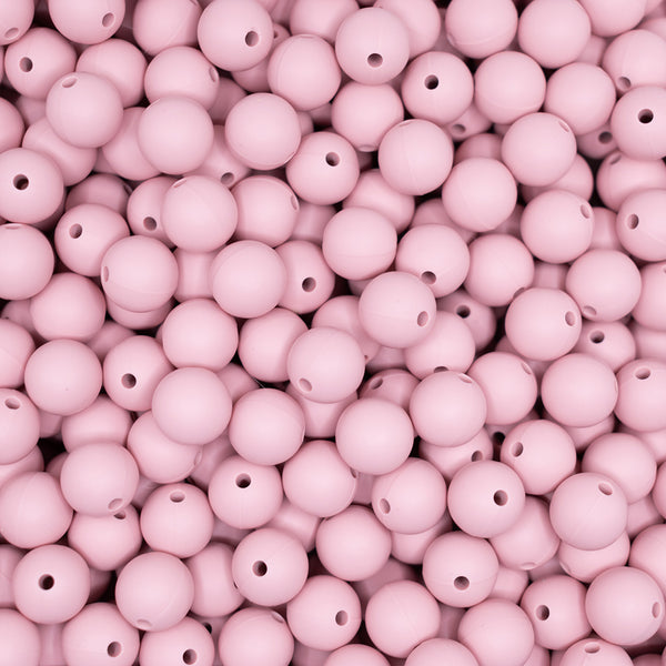top view of a pile of 12mm Blush Pink Round Silicone Bead
