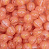 close up view of a pile of 12mm Coral Orange Cats Eye Acrylic Bubblegum Beads - 20 Count