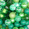 close up view of a pile of 12mm Green Acrylic Bubblegum Bead Mix