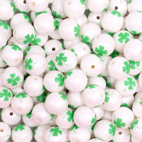 Close up view of a pile of 12mm Clover Print Bubblegum Beads