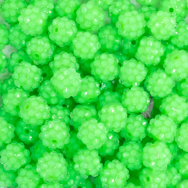 close up view of a pile of 12mm Green Neon Rhinestone Bubblegum Beads