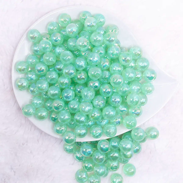 top view of a pile of 12mm Green Opal Bubblegum Beads - 20 Count