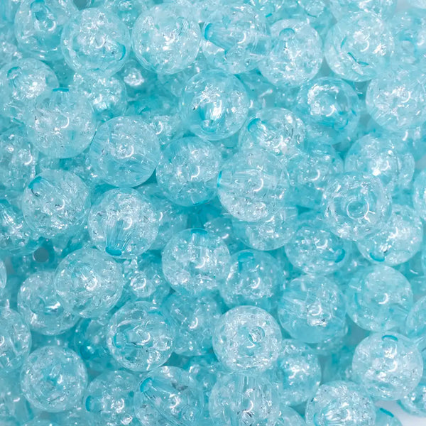 close up view of a pile of 12mm Light Blue Crackle Bubblegum Beads