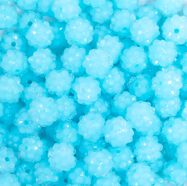 close up view of a pile of 12mm Light Blue Neon Rhinestone Bubblegum Beads