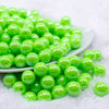front view of a pile of 12mm Neon Lime Green AB Solid Acrylic Bubblegum Beads