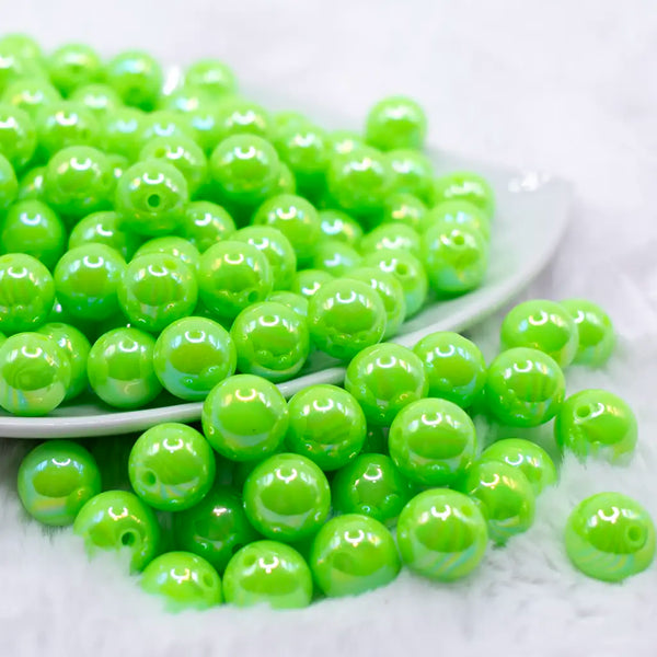 front view of a pile of 12mm Neon Lime Green AB Solid Acrylic Bubblegum Beads