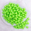 top view of a pile of 12mm Neon Lime Green AB Solid Acrylic Bubblegum Beads