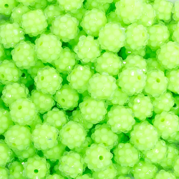 close up view of a pile of 12mm Lime Green Neon Rhinestone Bubblegum Beads