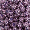 close up view of a pile of 12mm Mauve Purple Rhinestone Bubblegum Beads