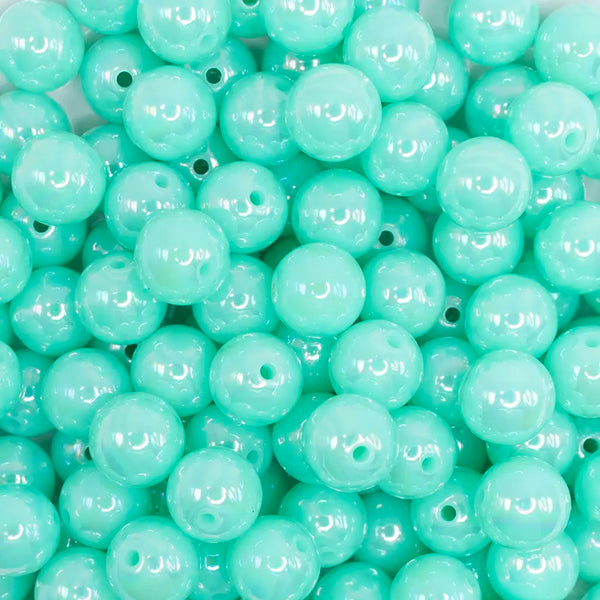close up view of a pile of 12mm Light Blue Blue Neon AB Solid Acrylic Bubblegum Beads