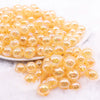 front view of a pile of 12mm Mustard Orange Crackle AB Bubblegum Beads