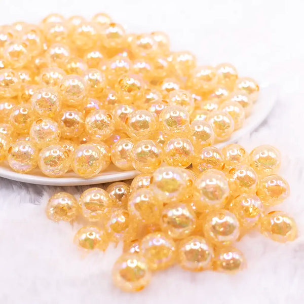 front view of a pile of 12mm Mustard Orange Crackle AB Bubblegum Beads