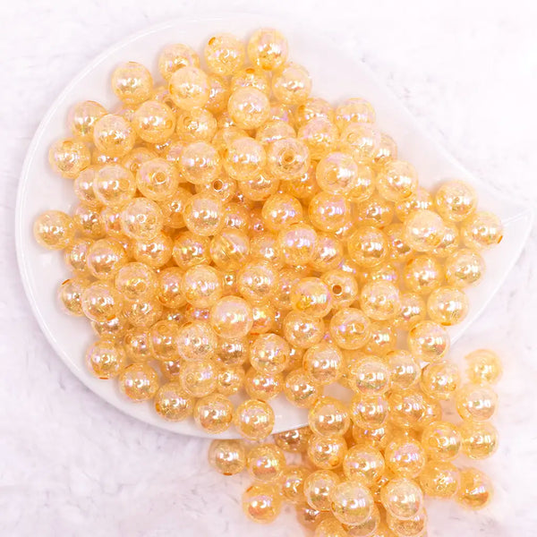 top view of a pile of 12mm Mustard Orange Crackle AB Bubblegum Beads