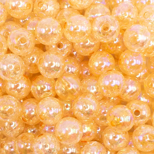 close up view of a pile of 12mm Mustard Orange Crackle AB Bubblegum Beads