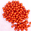 top view of a pile of 12mm Orange Miracle Bubblegum Beadtop view of a pile of 12mm Orange Miracle Bubblegum Bead