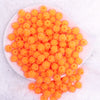 top view of a pile of 12mm Orange Neon Rhinestone Bubblegum Beads