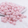 front view of a pile of 12mm Pastel Pink Rhinestone AB Bubblegum Beads