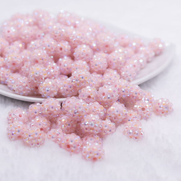 front view of a pile of 12mm Pastel Pink Rhinestone AB Bubblegum Beads