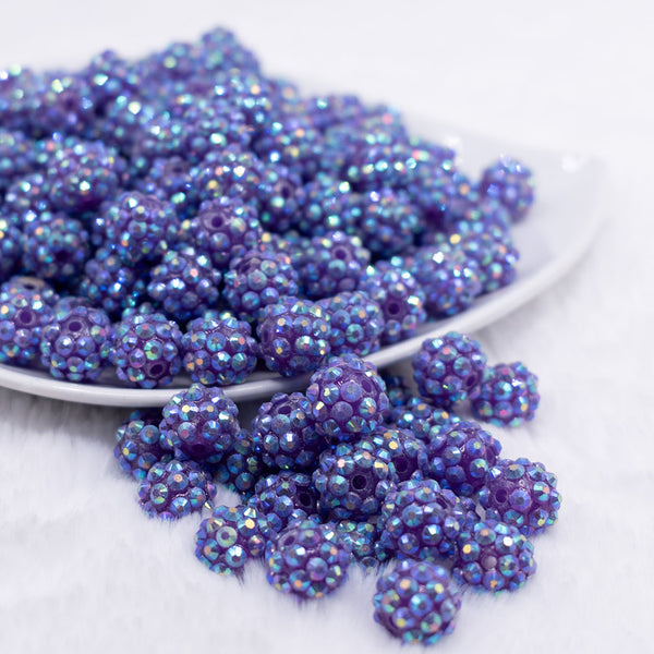 front view of a pile of 12mm Patagonia Purple Rhinestone AB Bubblegum Beads