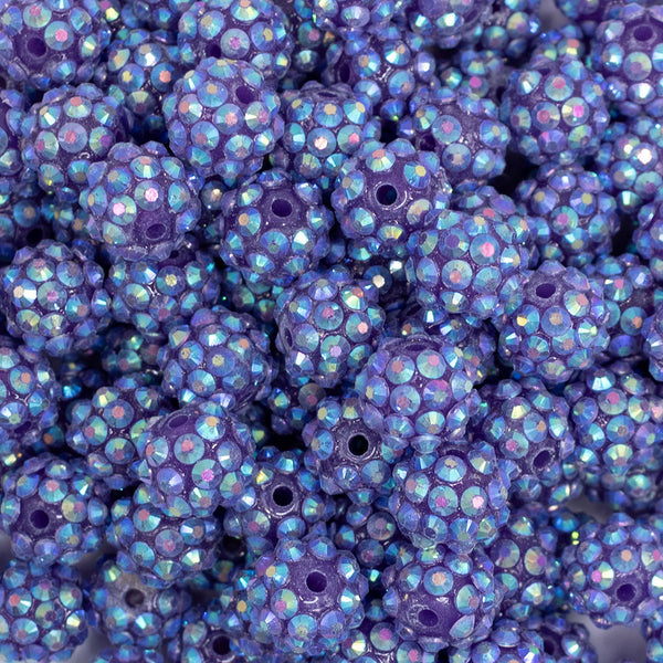 close up view of a pile of 12mm Patagonia Purple Rhinestone AB Bubblegum Beads