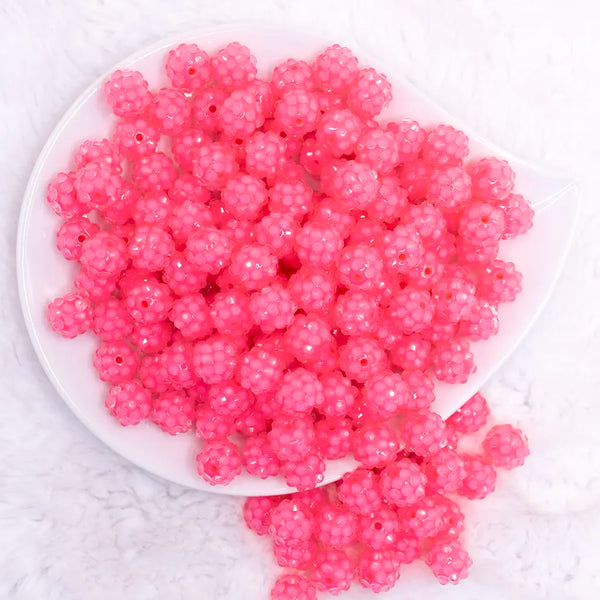 top view of a pile of 12mm Pink Neon Rhinestone Bubblegum Beads