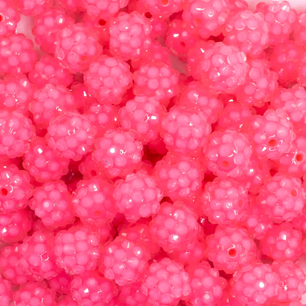 close up view of a pile of 12mm Pink Neon Rhinestone Bubblegum Beads