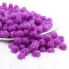 front view of a pile of 12mm Purple Neon Rhinestone Bubblegum Beads