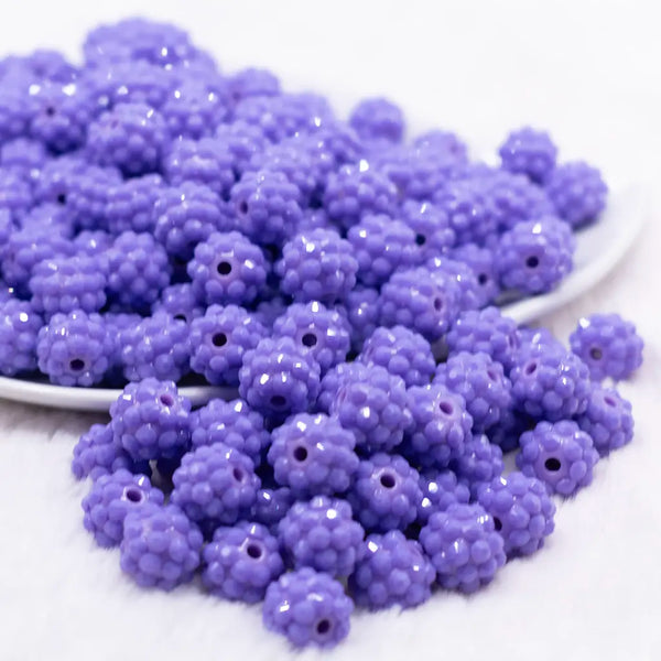 front view of a pile of 12mm Purple on Purple Rhinestone Bubblegum Beads