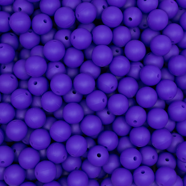 top view of a pile of 12mm Deep Purple Round Silicone Bead