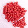 top view of a  pile of 12mm Sunset Red with Glitter Faux Pearl Acrylic Bubblegum Beads - 20 Count