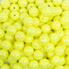 close up view of a pile of 12mm Yellow Neon AB Solid Bubblegum Beads
