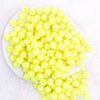 top view of a pile of 12mm Yellow Neon Rhinestone Bubblegum Beads