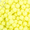 close up view of a pile of 12mm Yellow Neon Rhinestone Bubblegum Beads