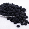 front view of a pile of 12mm Black Ball Bead Acrylic Bubblegum Beads