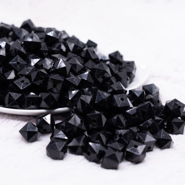 front view of a pile of 12mm Black Cube Faceted Bubblegum Beads