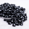 front view of a pile of 12mm Black with White Stars Bubblegum Beads