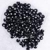 top view of a pile of 12mm Black with White Stars Bubblegum Beads