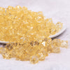front view of a pile of 12mm Blonde Yellow Transparent Cube Faceted Bubblegum Beads