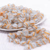 front view of a pile of 12mm Blue Cats Eye Acrylic Bubblegum Beads - 20 Count