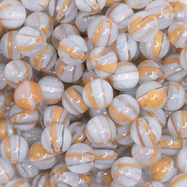 close up view of a pile of 12mm Blue Cats Eye Acrylic Bubblegum Beads - 20 Count