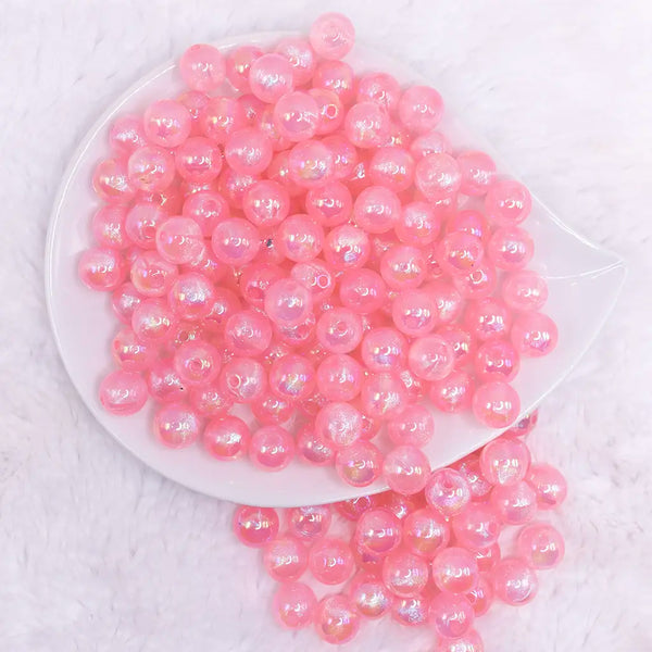 top view of a pile of 12mm Bright Pink Opal Bubblegum Beads - 20 Count