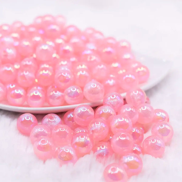 front view of a pile of 12mm Bright Pink Opal Bubblegum Beads - 20 Count