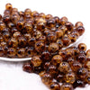 front view of a pile of 12mm Brown Crackle Leopard Print Bubblegum Beads - 20 Count