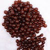 top view of a pile of 12mm Brown Crackle Bubblegum Beads